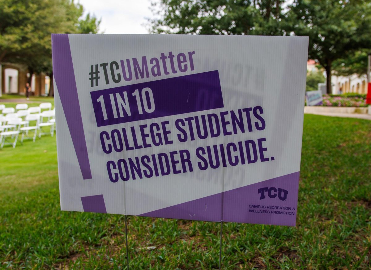 Signs are set up in the TCU campus commons to bring awareness to suicide among college students. (TCU360/ Tyler Chan)