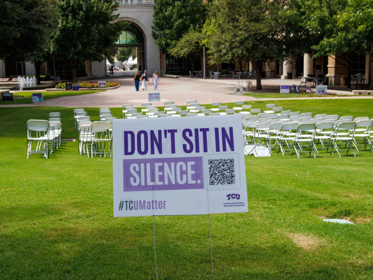 Signs are set up in the TCU campus commons to bring awareness to suicide among college students. (TCU360/ Tyler Chan)