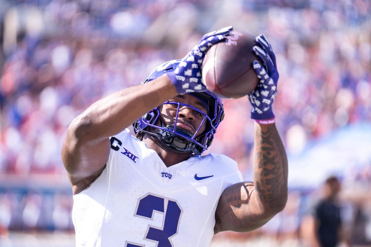 TCU wide receiver Savion Williams warms up at Gerald J. Ford Stadium, Sept. 21, 2024. The TCU Horned Frogs were defeated by the SMU Mustangs 44-66. (TCU 360 Photo by Shane Manson)