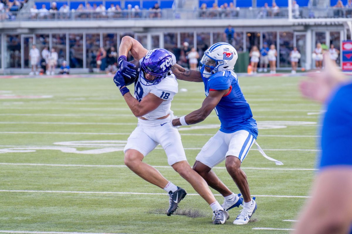 Wide receiver Jack Bech attempts to break a tackle at Gerald J. Ford Stadium, Sept. 21, 2024. The TCU Horned Frogs were defeated by the SMU Mustangs 44-66. (TCU 360 Photo by Shane Manson)