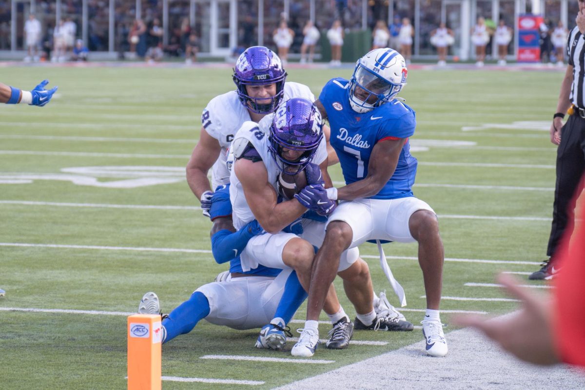 Wide receiver Jack Bech attempts to break a tackle at Gerald J. Ford Stadium, Sept. 21, 2024. The TCU Horned Frogs were defeated by the SMU Mustangs 44-66. (TCU 360 Photo by Shane Manson)