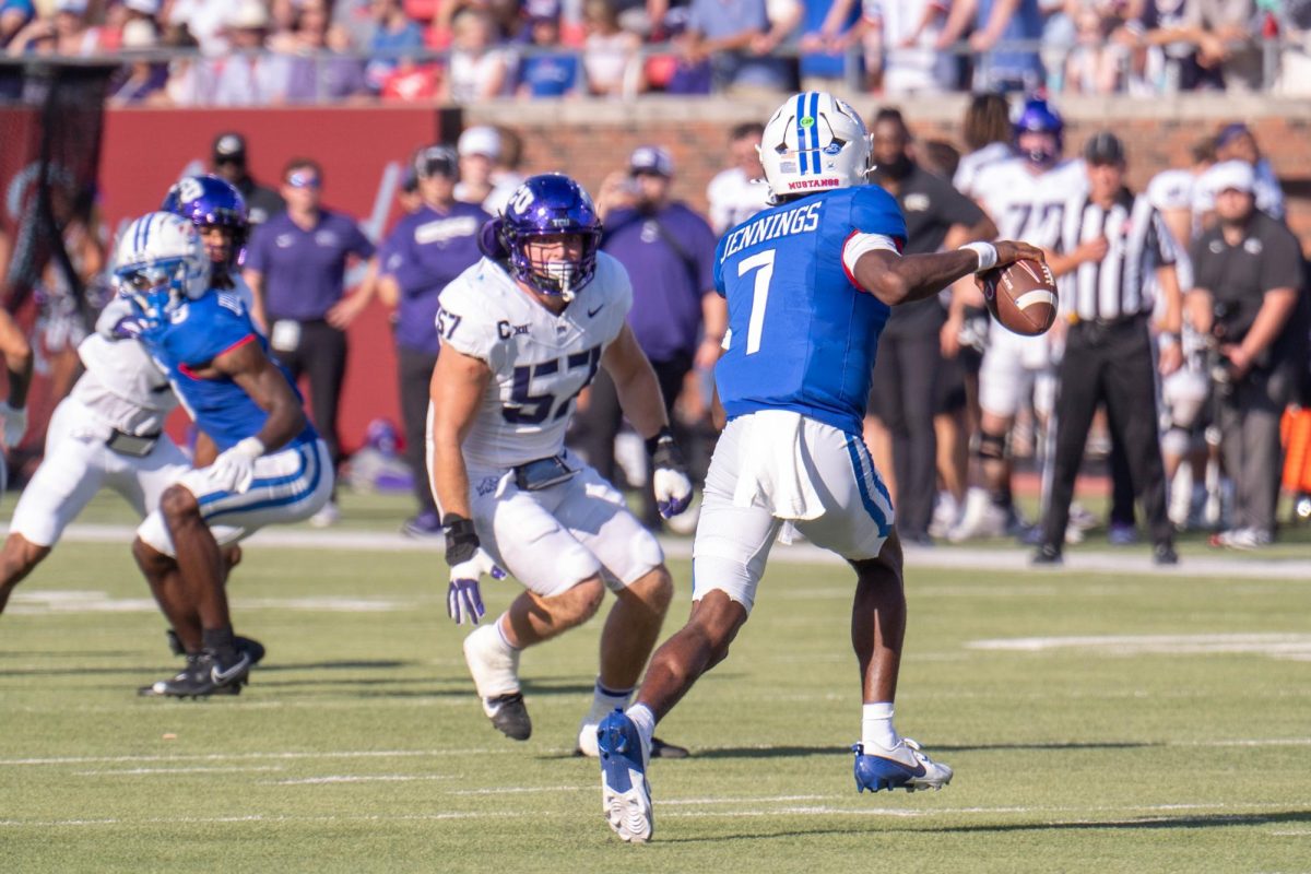 Linebacker Johnny Hodges spies QB Kevin Jennings at Gerald J. Ford Stadium, Sept. 21, 2024. The TCU Horned Frogs were defeated by the SMU Mustangs 44-66. (TCU 360 Photo by Shane Manson)