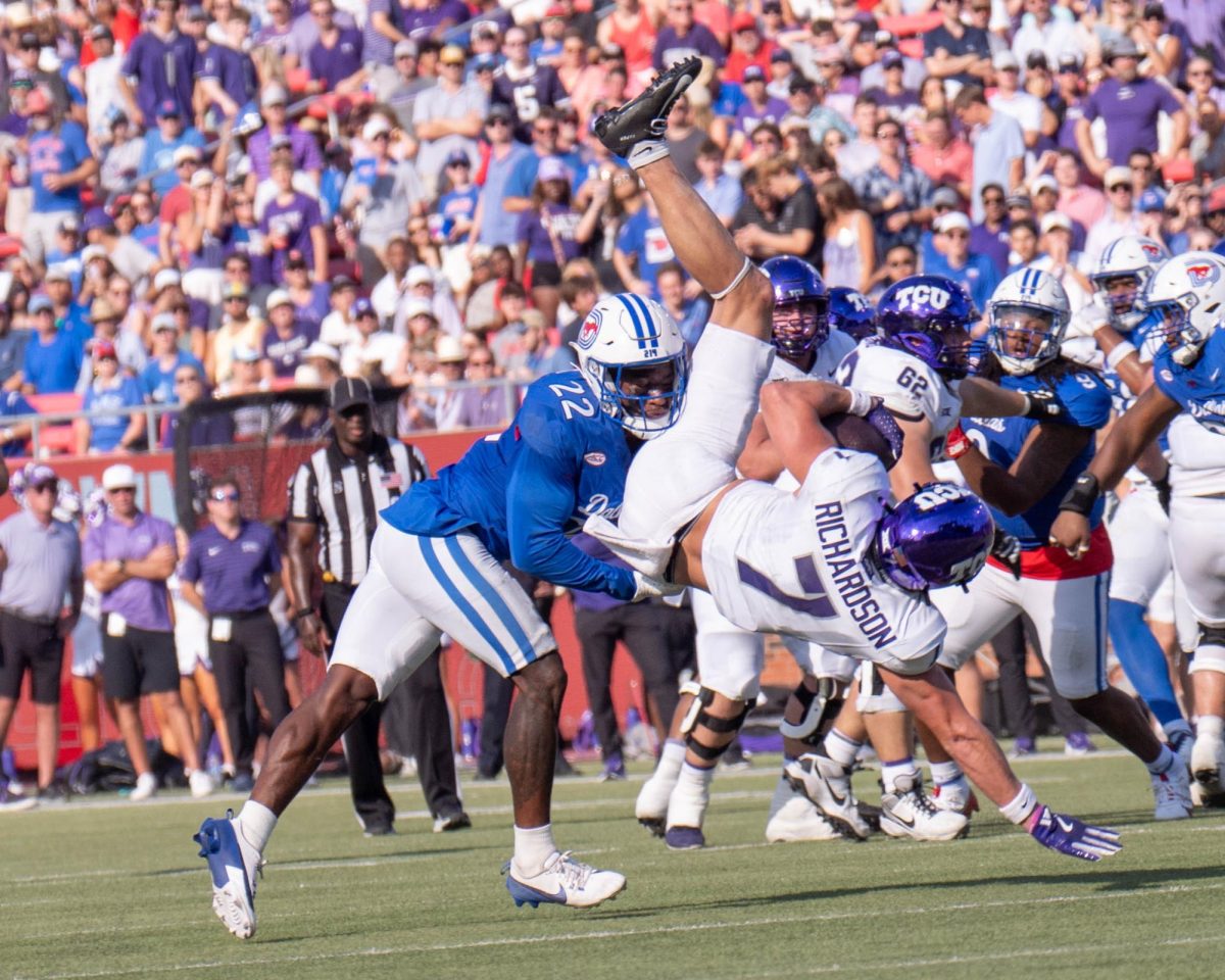 Wide receiver JP Richardson is tackled after a reception at Gerald J. Ford Stadium, Sept. 21, 2024. The TCU Horned Frogs were defeated by the SMU Mustangs 44-66. (TCU 360 Photo by Shane Manson)