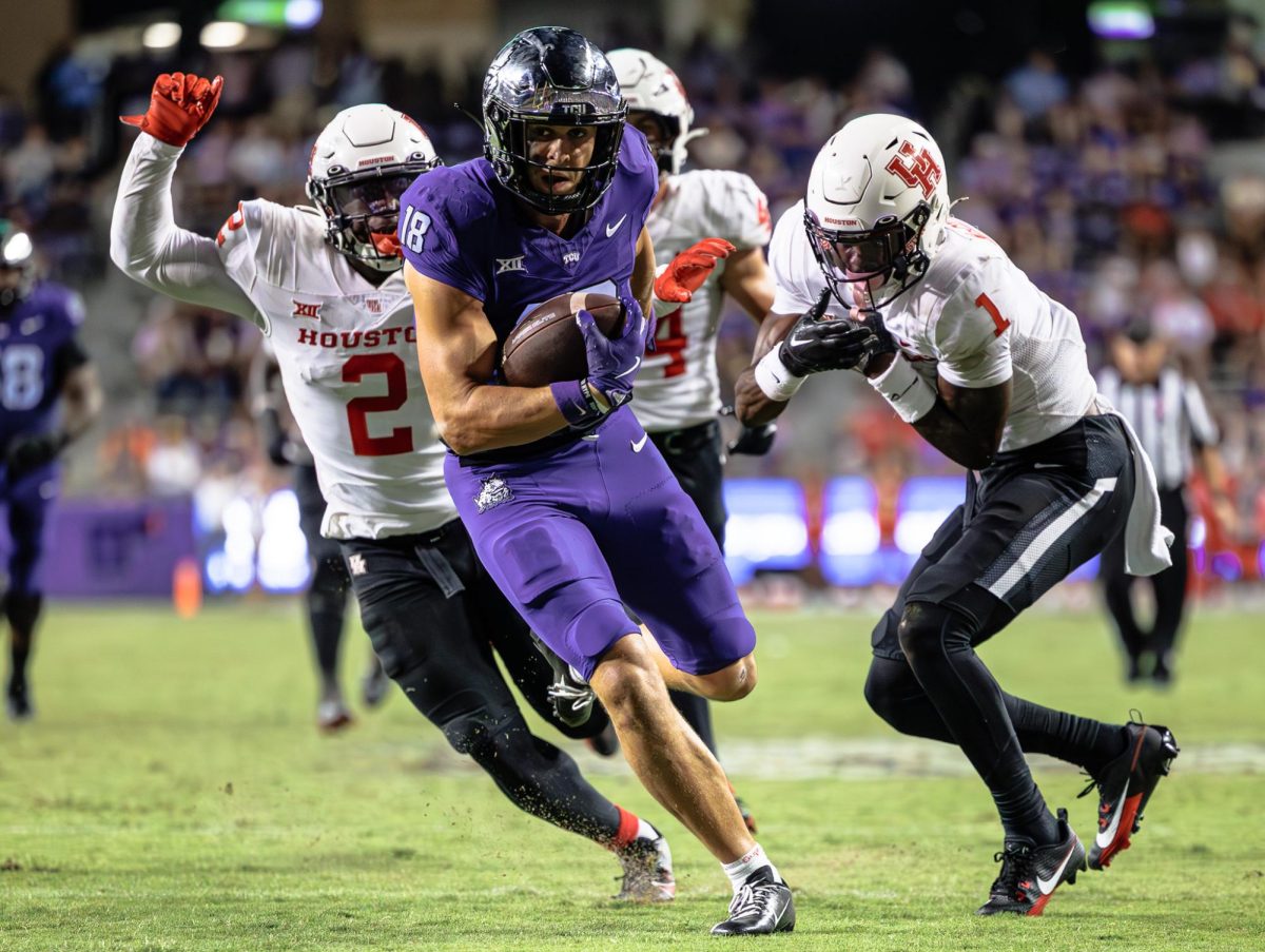 TCU wide receiver Jack Bech breaks some tackles to get free for a touchdown at Amon G. Carter Stadium in Fort Worth, Texas on October 4th, 2024. The TCU Horned Frogs fell to the Houston Cougars 19-31 (TCU360/Tyler Chan)