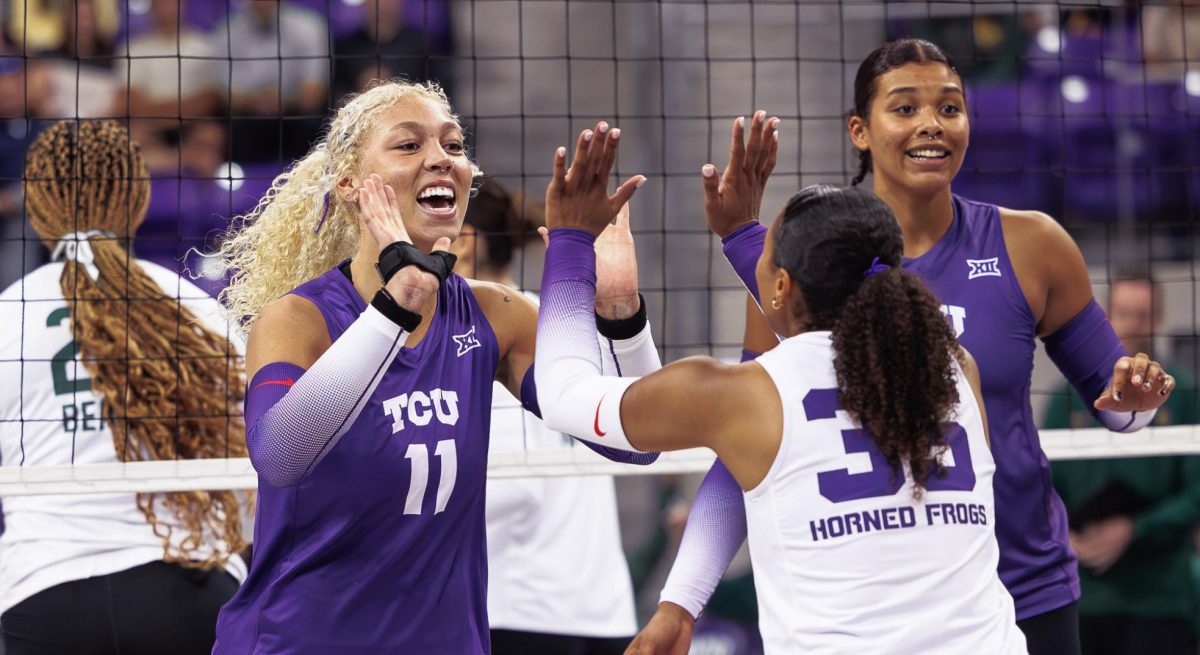 TCU volleyball Becca Kelly and Cecily Bramschreiber celebrate after the play at Ed &amp; Rae Schollmaier Arena in Fort Worth, Texas on October 6th, 2024. (TCU360/Tyler Chan)