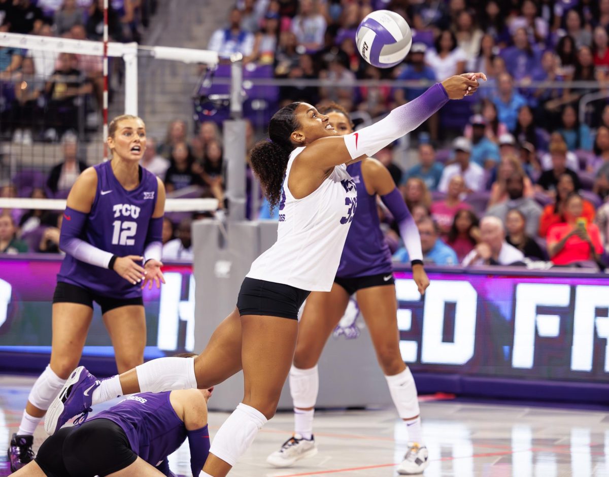 TCU libero Cecily Bramschreiber hits the ball at Ed &amp; Rae Schollmaier Arena in Fort Worth, Texas on October 6th, 2024. (TCU360/Tyler Chan)