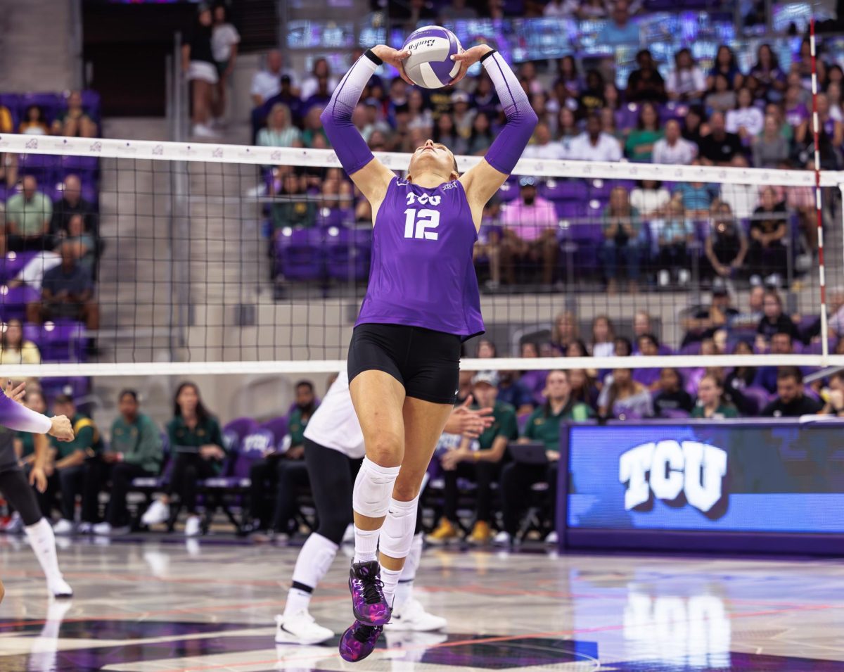 TCU setter Lily Nicholson sets the ball at Ed &amp; Rae Schollmaier Arena in Fort Worth, Texas on October 6th, 2024. (TCU360/Tyler Chan)