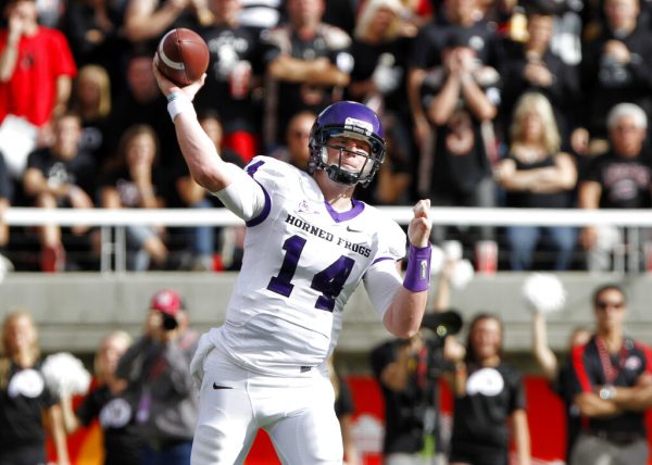 TCU quarterback Andy Dalton (14) passes against Utah during the first half of their NCAA college football game Saturday, Nov. 6, 2010, in Salt Lake City.  (AP Photo/Jim Urquhart)