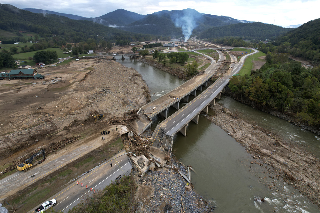 A bridge along Interstate 26 is destroyed in the aftermath of Hurricane Helene Friday, Oct. 4, 2024, in Erwin, Tenn. 