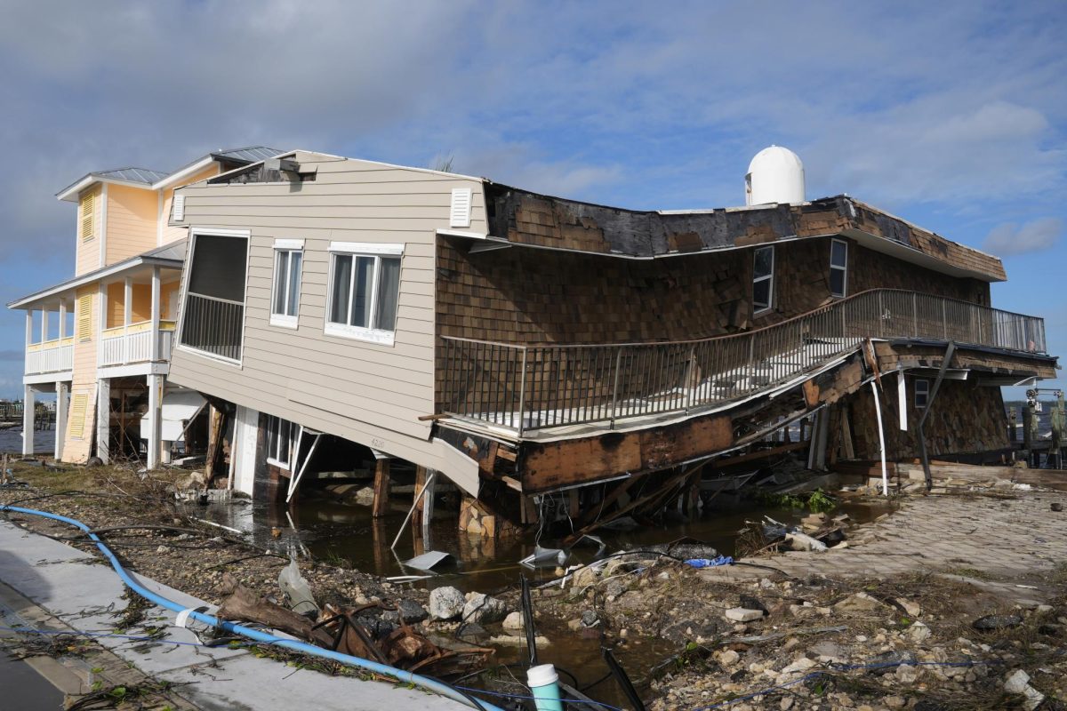 A house lies in ruins after sustaining tornado and flood damage from Hurricane Milton, Thursday, Oct. 10, 2024, in Matlacha, Fla.  (AP Photo/Marta Lavandier)