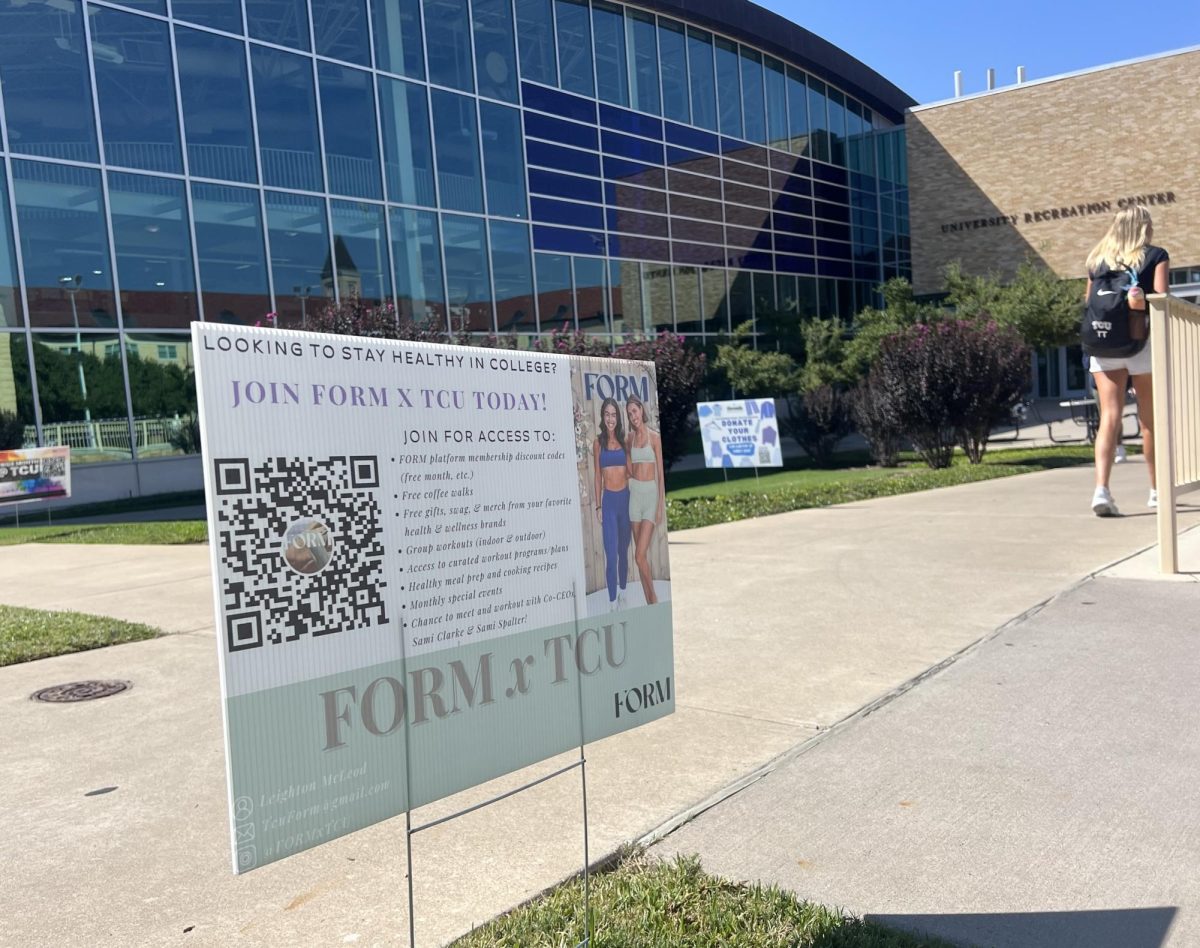 A sign promoting FORM x TCU in front of the TCU Recreation Center. 