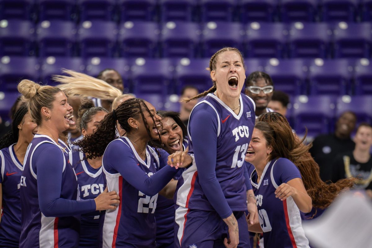 Sedona Prince and the Womens Basketball Team celebrate winning a contest at Schollmaier Live, Oct. 25, 2024.