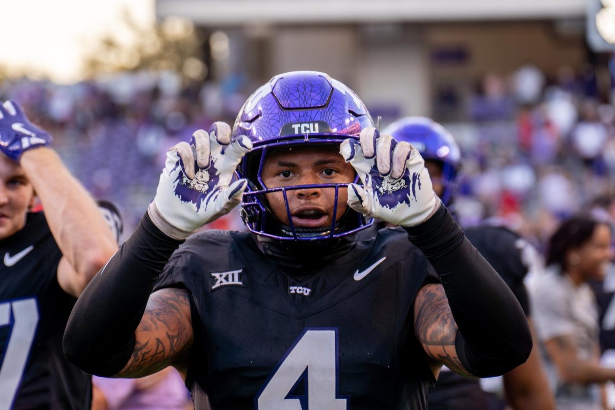 Cam Cook celebrates a win at Amon G. Carter Stadium, Oct. 26, 2024. TCU overcame a 17-point deficit to defeat Texas Tech 35-34. (TCU 360 Photo by Shane Manson)