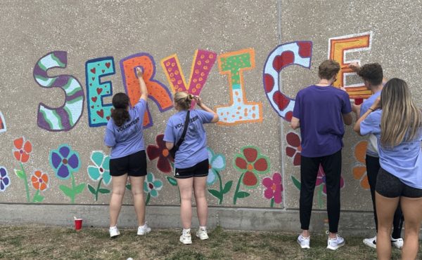 Students draw a mural as a part of TCU Day of Service 2023. (Courtesy of The Office of Leadership and Student Involvement)