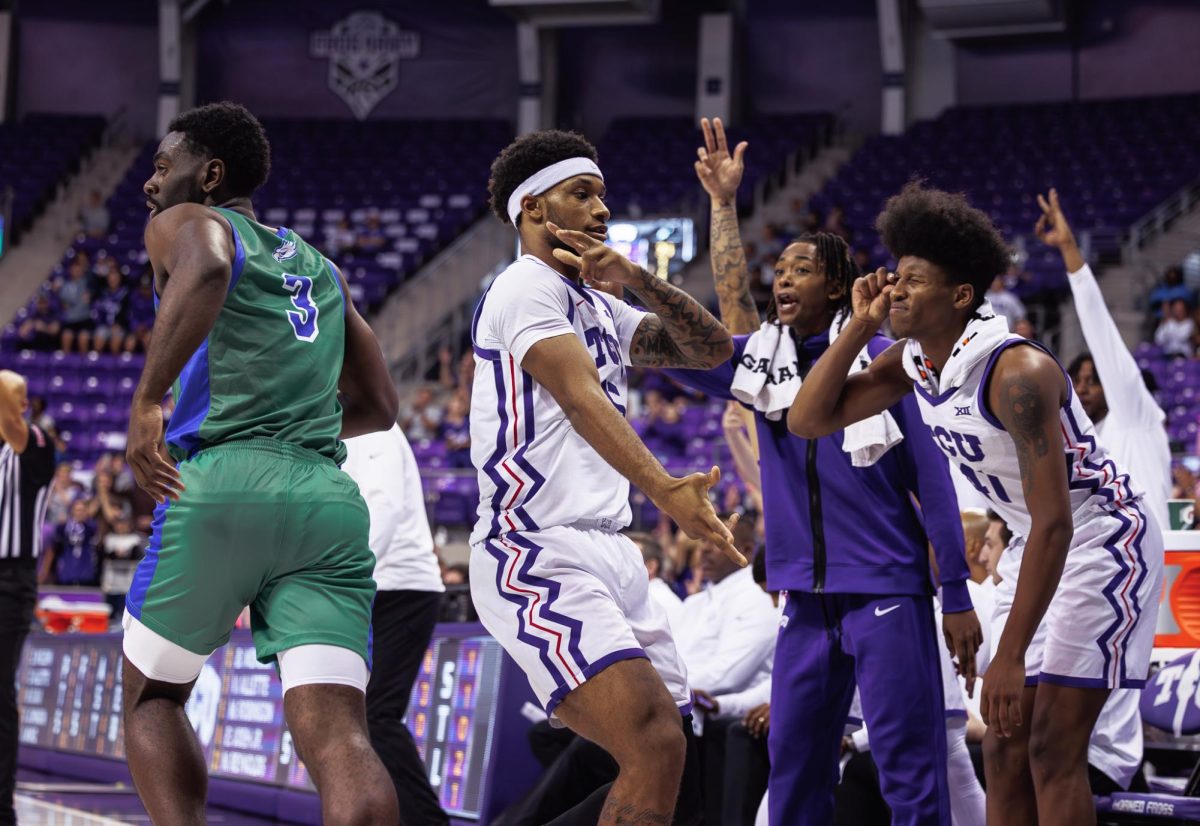 TCU forward Micah Robinson celebrates after making a three pointer at Schollmaier Arena in Fort Worth, Texas, on November 8th, 2024. The TCU Horned Frogs beat the Florida Gulf Coast Eagles 67-51. (TCU360/ Tyler Chan)