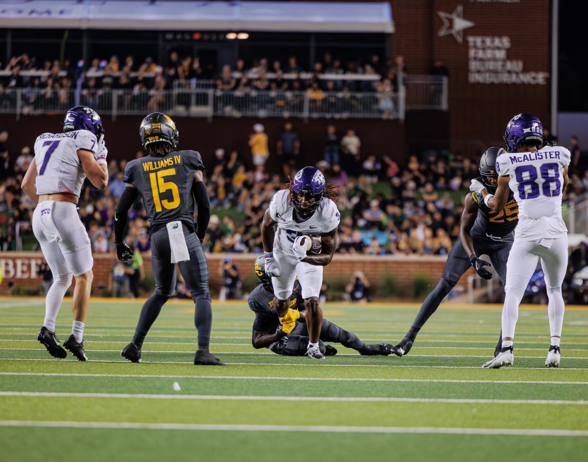 TCU wide receiver Savion Williams runs through the defense at McLane Stadium in Waco, Texas on November 2nd, 2024. The TCU Horned Frogs fell to the Baylor Bears 34-37.(TCU360/ Tyler Chan)