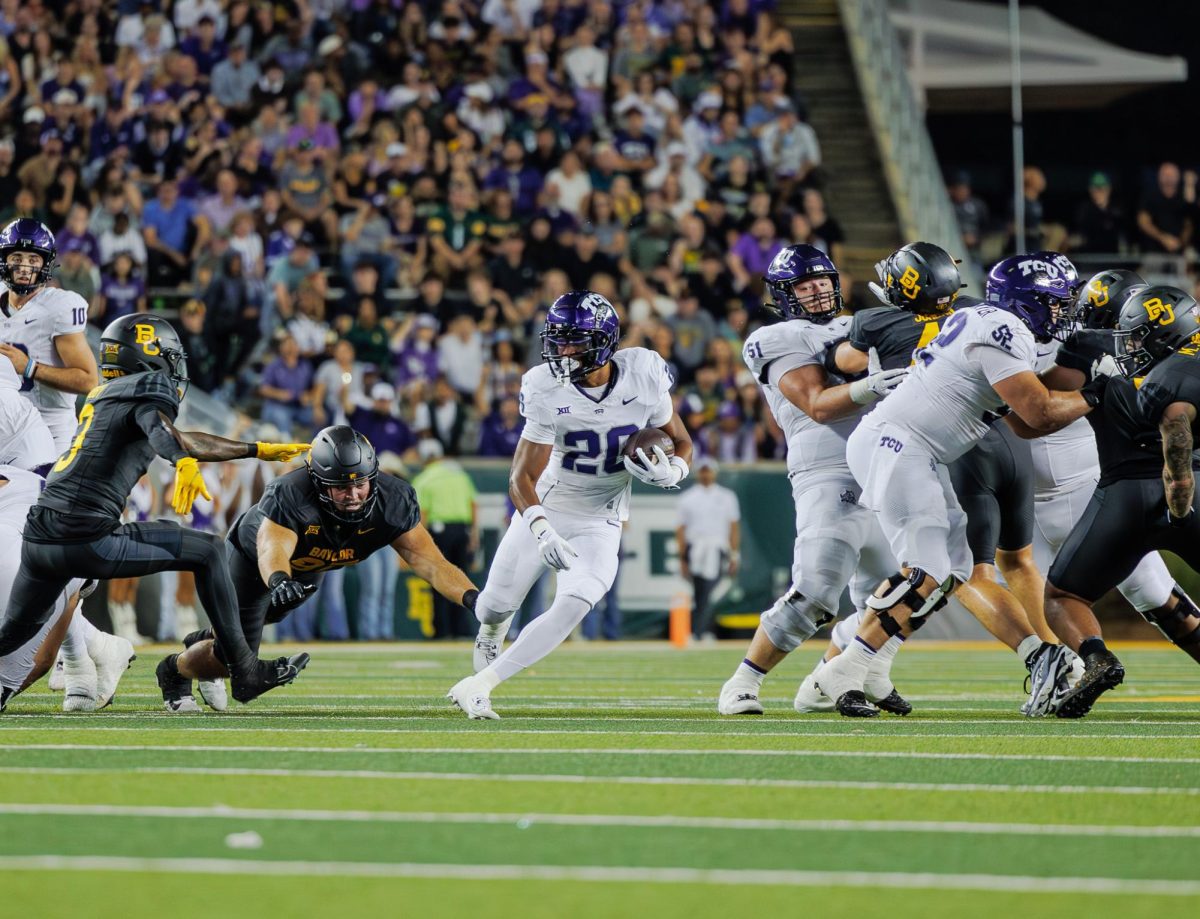 TCU running back Jeremy Payne runs through a hole in the defense at McLane Stadium in Waco, Texas on November 2nd, 2024. The TCU Horned Frogs fell to the Baylor Bears 34-37.(TCU360/ Tyler Chan)