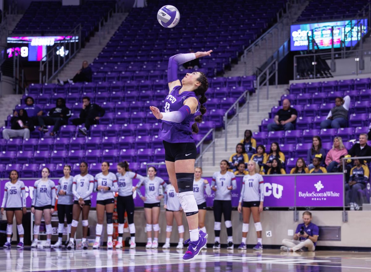 TCU libero Alice Volpe serves the ball at Schollmaier Arena in Fort Worth, Texas on November 7th, 2024. The TCU Horned Frogs swept the UCF Knights 3-0. (TCU360/ Tyler Chan)