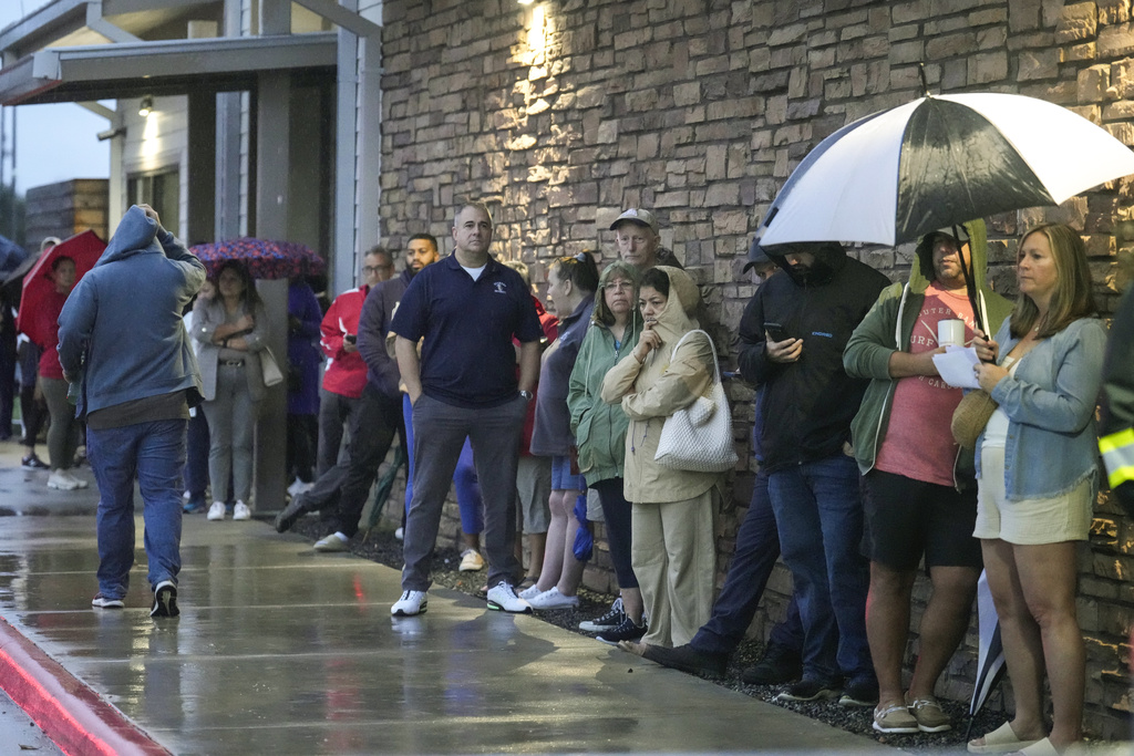 Voters line up to cast their ballots during Election Day at the Richard and Meg Weekley Community Center on Tuesday, Nov. 5, 2024 in Cypress, Texas. (Brett Coomer/Houston Chronicle via AP)