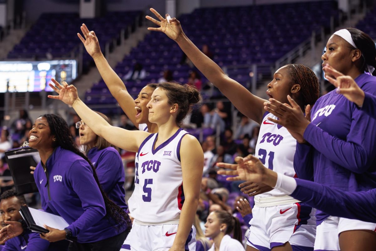 TCU bench celebrates after a three pointer at Schollmaier Arena in Fort Worth, Texas on November 13th, 2024. (TCU360/Tyler Chan)