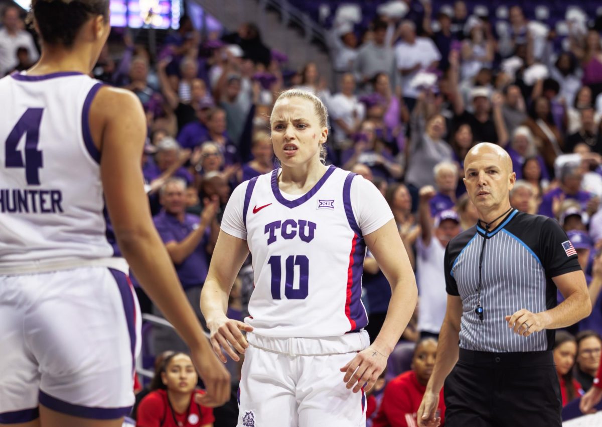 TCU guard Hailey Van Lith celebrates with teammate Donovyn Hunter after the playat Schollmaier Arena in Fort Worth, Texas on November 17th, 2024. The TCU Horned Frogs beat the NC State Wolfpack 76-73. (TCU360/Tyler Chan)