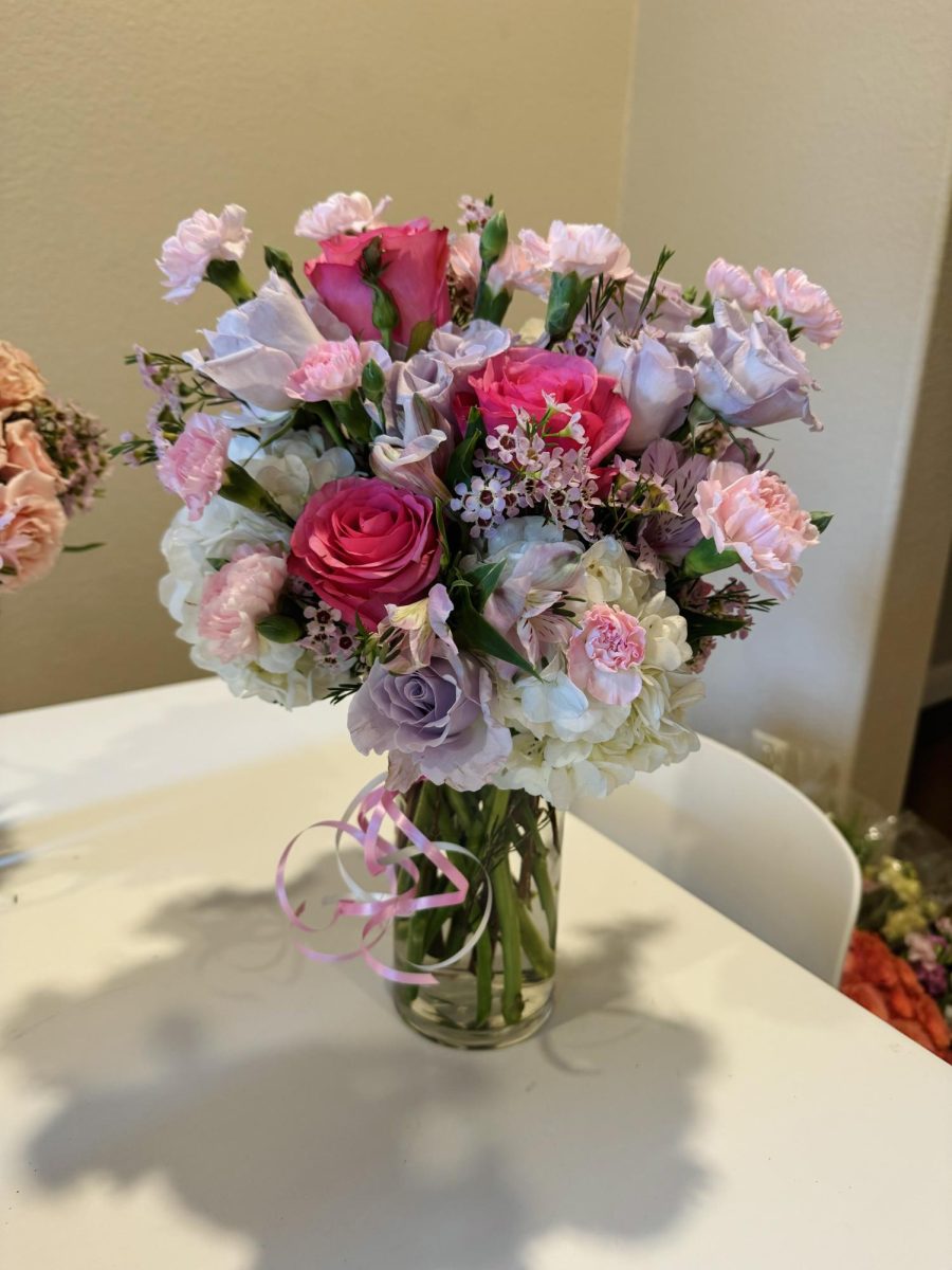 Floral arrangement by The A's Bouquets.