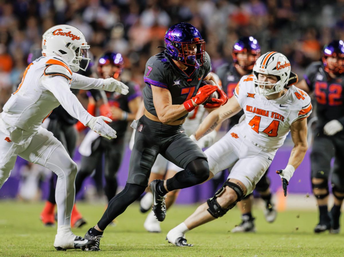 TCU wide receiver JP Richardson runs with the ball upfield at Amon G. Carter Stadium in Fort Worth, Texas on November 9th, 2024. The TCU Horned Frogs beat the Oklahoma State Cowboys 38-13. (TCU360/ Tyler Chan)