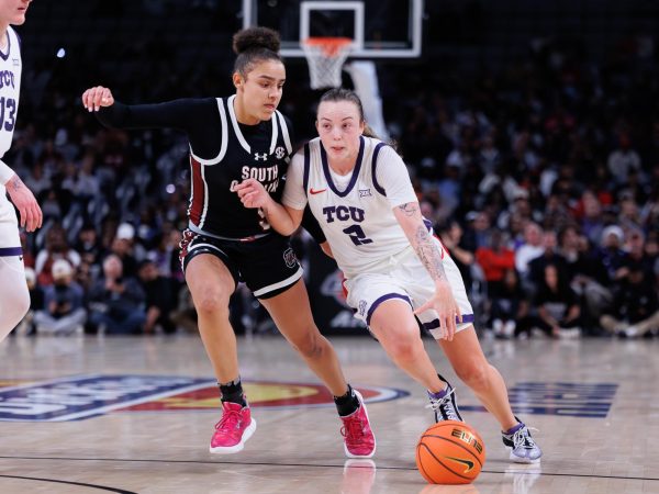 TCU guard Madison Conner drives towards the basket at Dickies Arena in Fort Worth, Texas, Dec. 8th 2024. The TCU Horned Frogs fell to the South Carolina Gamecocks 52-85. (TCU360/ Tyler Chan)