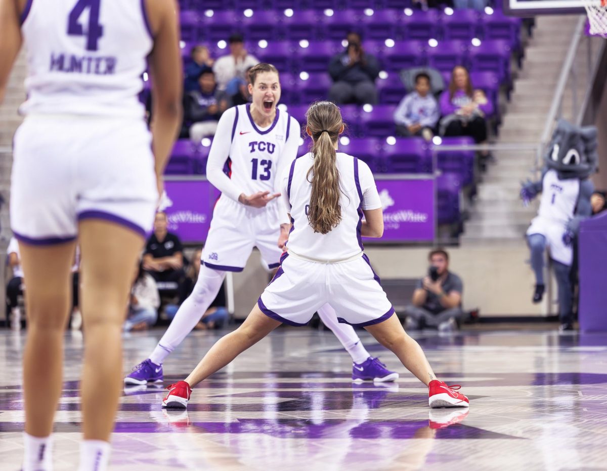 TCU players Sedona Prince and Madison Conner celebrate after the play at Schollmaier Arena in Fort Worth, Texas, Dec. 4th, 2024. The TCU Horned Frogs beat the Florida Atlantic Owls 78-42. (TCU360/Tyler Chan)