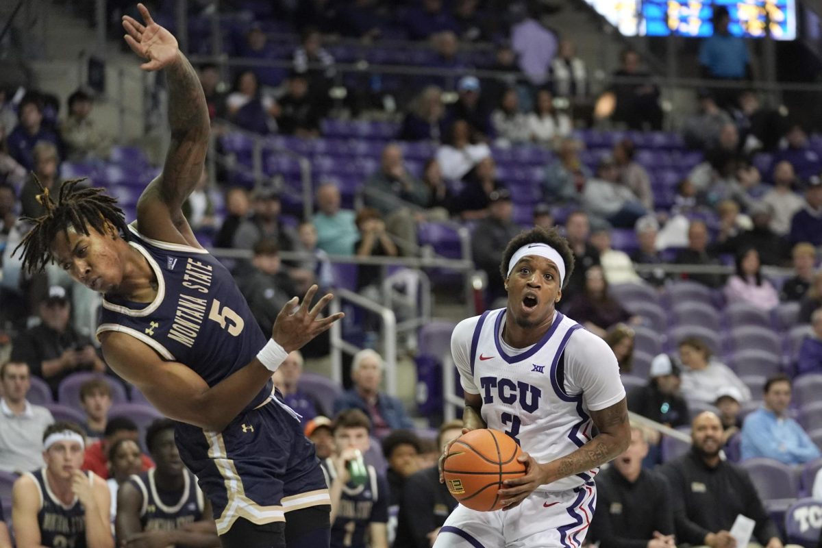 TCU guard Vasean Allette (3) sheds defender Montana State guard Bryce Zephir (5) during the first half of an NCAA college basketball game, Sunday, Dec. 22, 2024, in Fort Worth, Texas. (AP Photo/LM Otero)