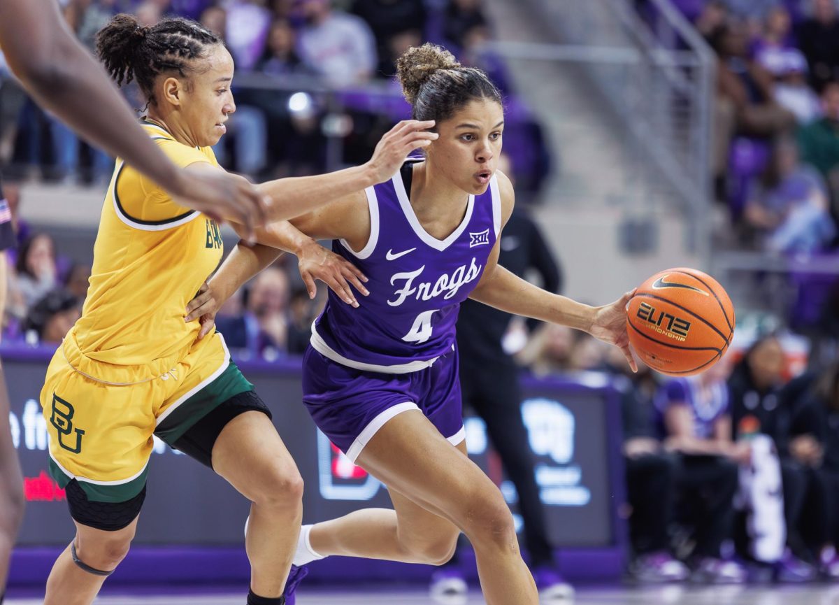 TCU guard Donovyn Hunter dribbles the ball at Schollmaier Arena in Fort Worth, Texas, Jan. 26, 2025. The TCU Horned Frogs beat the Baylor Bears 80-75.  (TCU360/Tyler Chan)