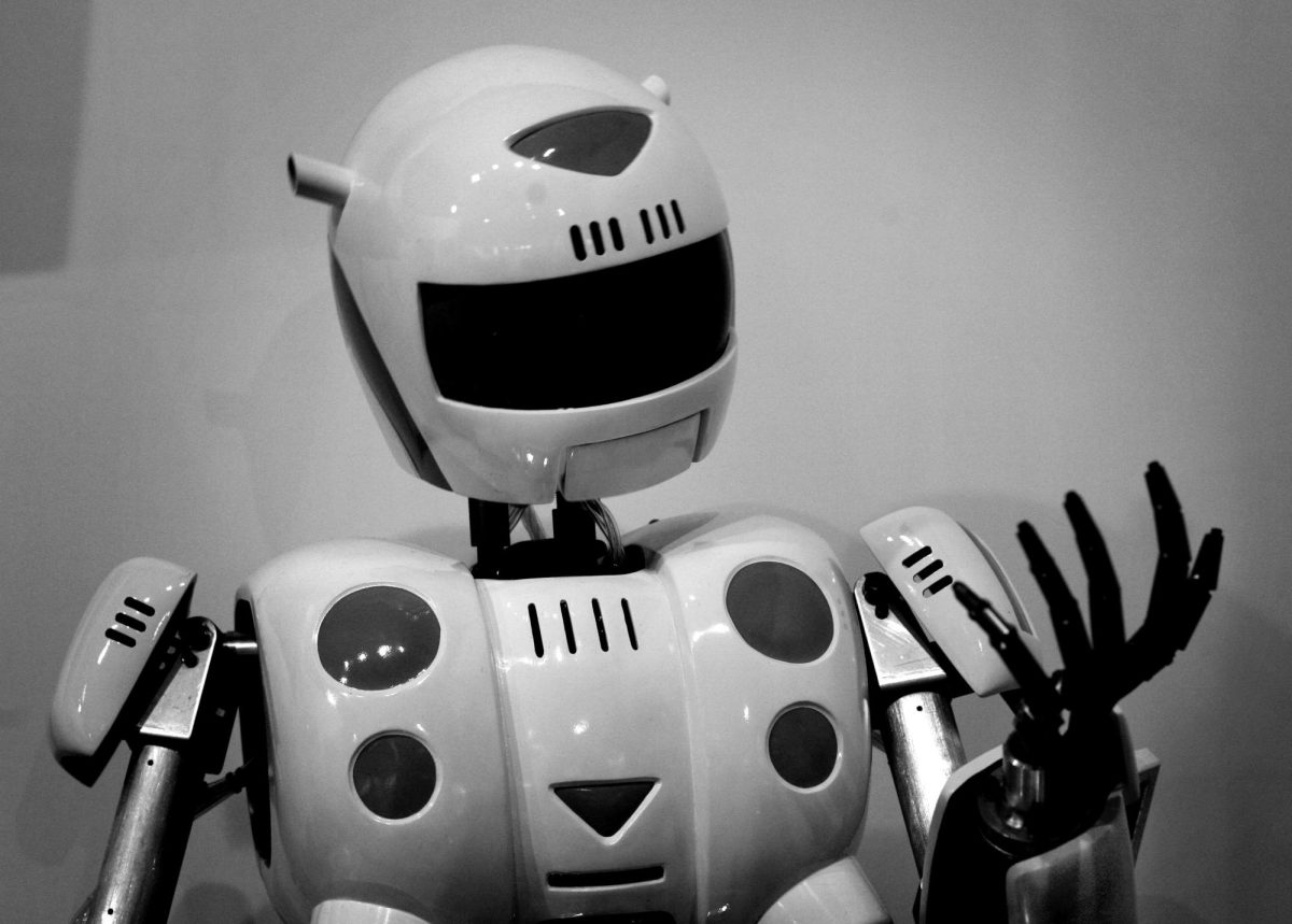 Japan The Humanoids: A robot stares at its own hand in Tokyo in December 2007. (AP Photo/David Guttenfelder)