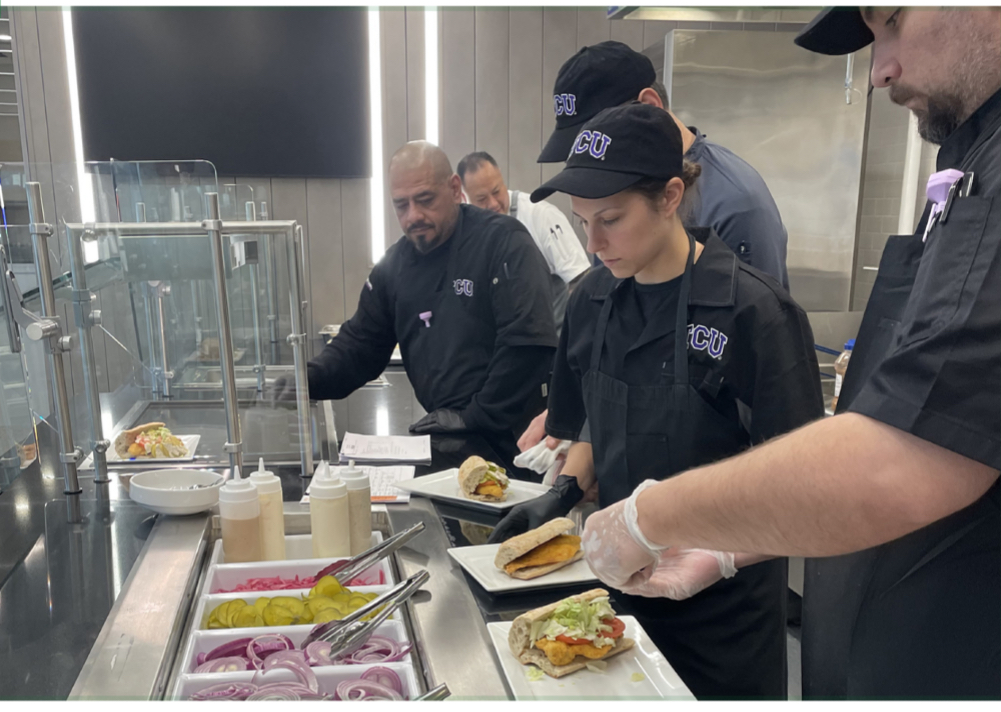 TCU staff preparing meals for the new East End Dinning at Gutierrez Hall.