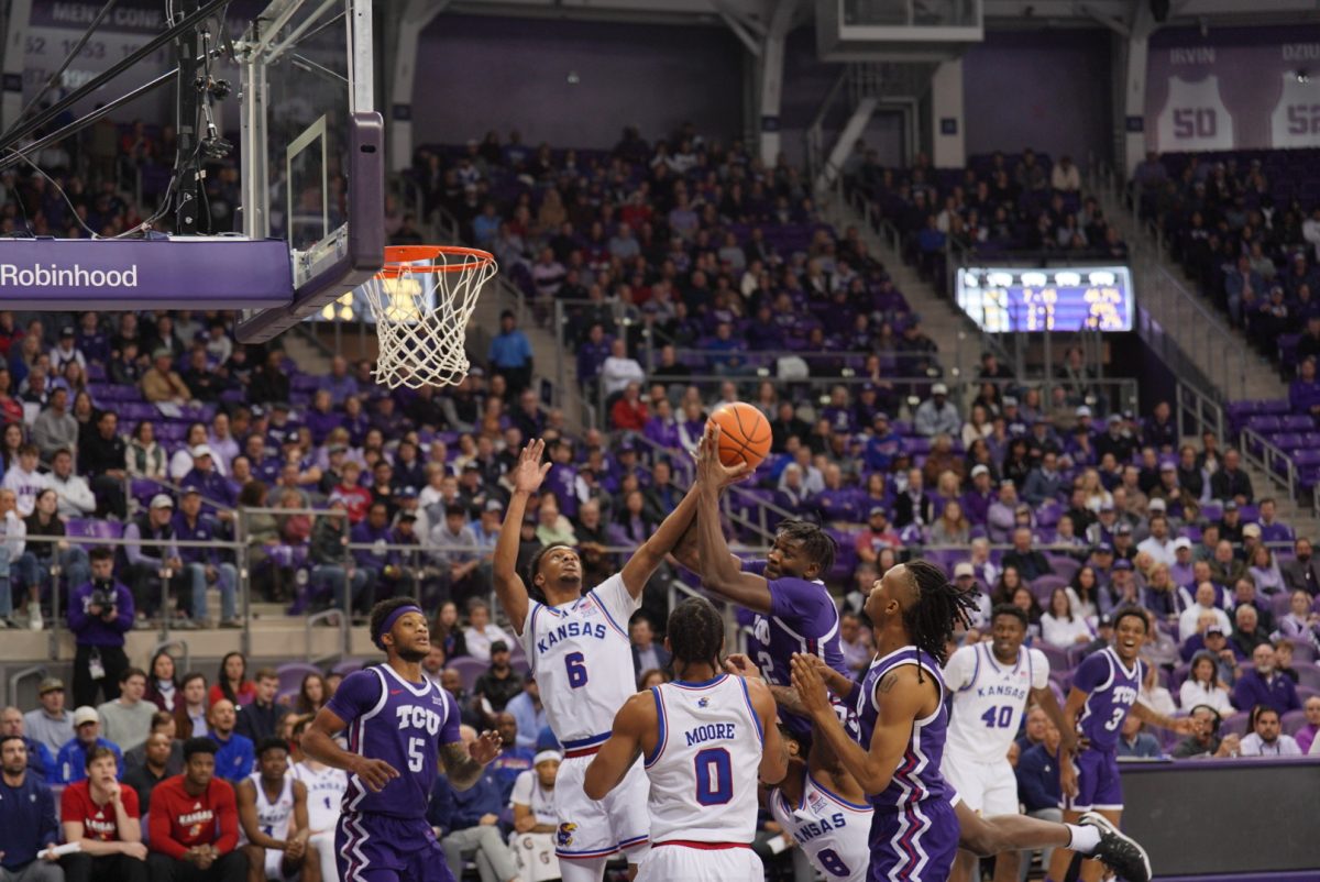 Malick Diallo going up for a rebound against Kansas on Wednesday, Jan. 22 at Ed and Rae Schollmaier Arena.