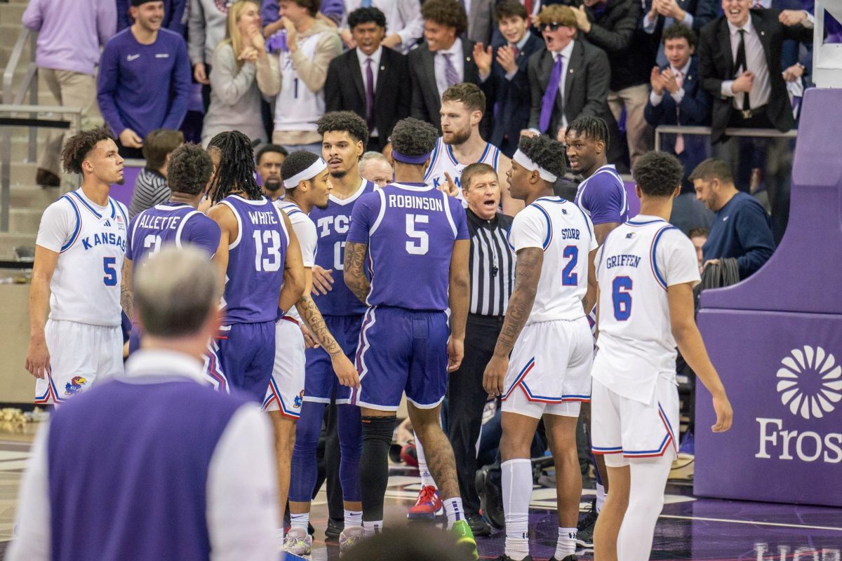 TCU and Kansas get into a heated scuffle at Schollmaier Arena, Jan. 22, 2025. The TCU Horned Frogs lost to the Kansas Jayhawks 61-74. (TCU 360 photo by Shane Manson)