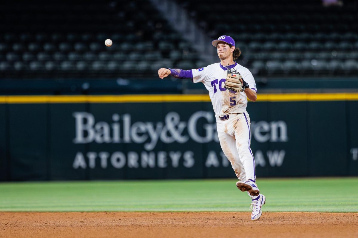 TCU shortstop Anthony Silva throws the ball towards first base at Globe Life Field in Arlington, Texas Feb. 23, 2025. The TCU Horned Frogs fell to the Kansas State Wildcats 10-2. (TCU360/ Tyler Chan)