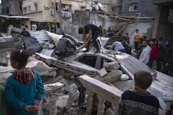 Looking for survivors in Palestine (AP Photo/ Fatima Shbair)