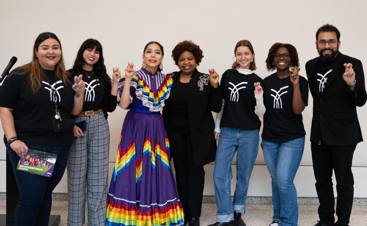 RRI Chairwoman Dr. Amiso George (center), Claudia Tiffany Rodrigues (third from left), and the RRI team at the one-year anniversary of the "150 Connections" mural (Pilar Olivas/Staff Writer)