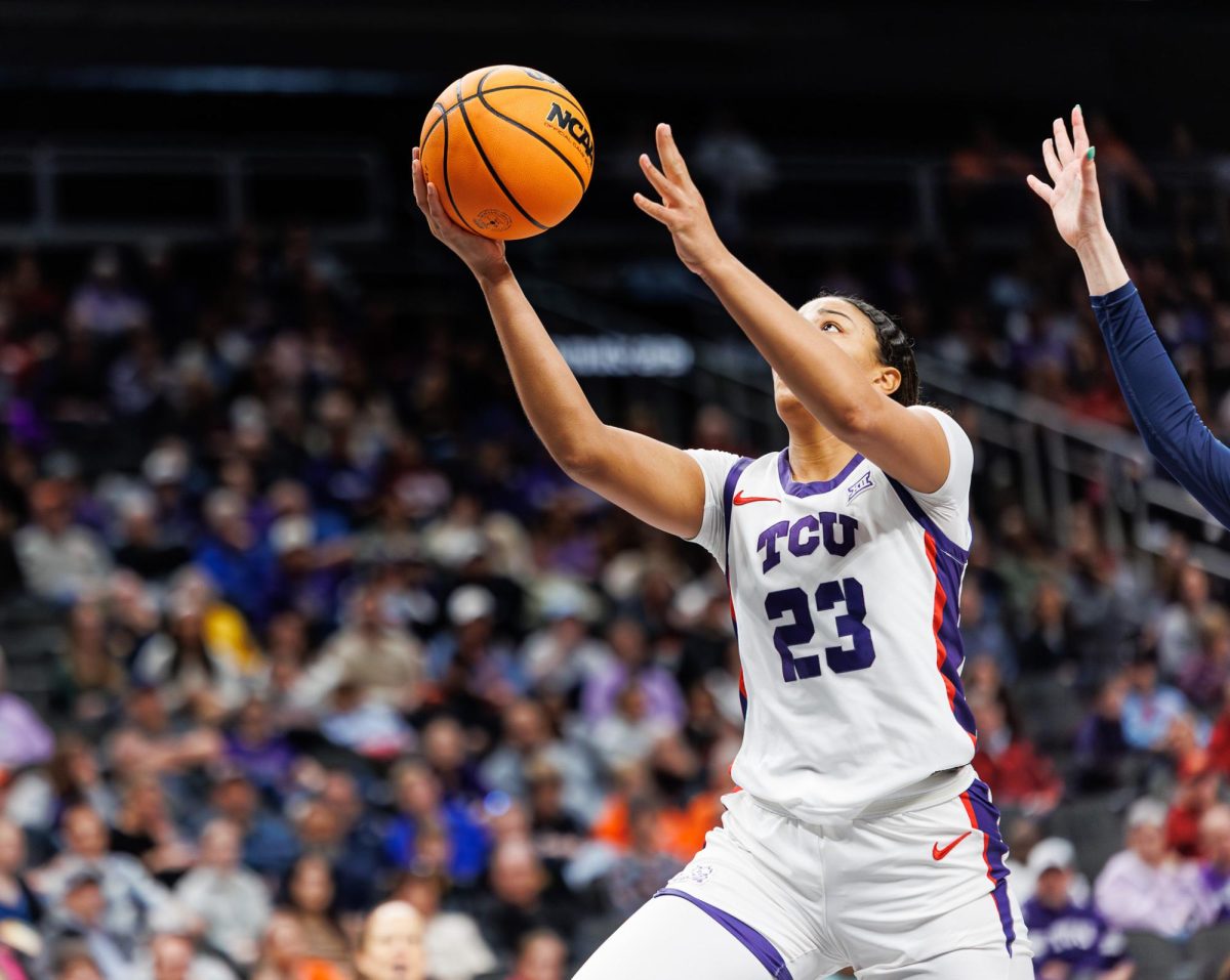 TCU forward Aaliyah Roberson goes up for a layup at T-Mobile Arena in Kansas City, Missouri Mar. 8, 2025. The TCU Horned Frogs beat the West Virginia Mountaineers 71-65. (TCU360/Tyler Chan)