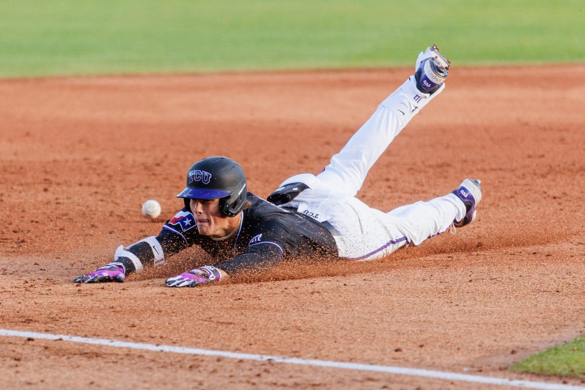 TCU right fielder Sawyer Strosnider slides into third base at Lupton Stadium in Fort Worth, Texas Mar. 4, 2025. (TCU360/Tyler Chan)