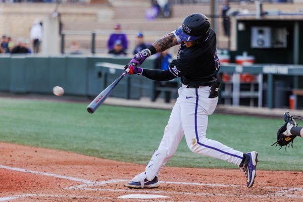 TCU first basemen Isaac Cadena hits the ball at Lupton Stadium in Fort Worth, Texas Mar. 4, 2025. (TCU360/Tyler Chan)
