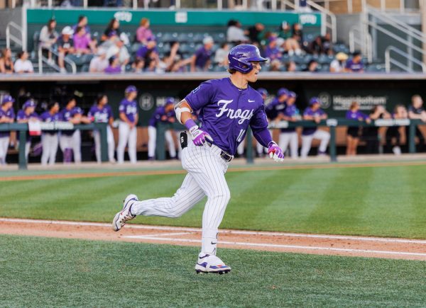 TCU outfielder Sawyer Strosnider runs down the line at Lupton Stadium in Fort Worth, Texas Mar. 26, 2025. (TCU360/ Tyler Chan)