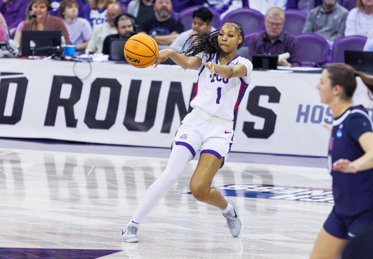 TCU guard Taylor Bigby passes the ball at Schollmaier Arena in Fort Worth, Texas, on March 21, 2025. The TCU Horned Frogs beat the FDU Knights 73-51. 