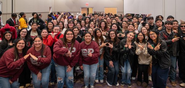 The seven organizations that make up the Multi-Cultural Greek Council after the Meet the Greeks event hosted this semester. 