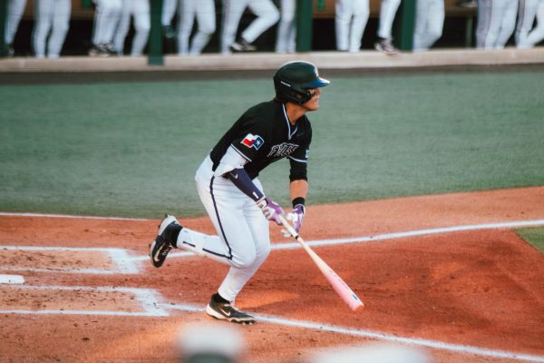 TCU Jack Bell hitting a homerun against UTRGV at Lupton Baseball Stadium. 