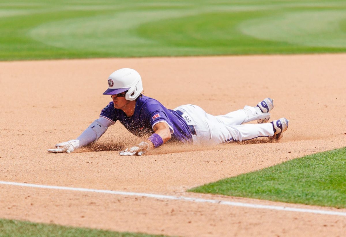 TCU third basemen Jack Bell slides into third base at Lupton Stadium in Fort Worth, Texas Apr. 26, 2025. (TCU360/Tyler Chan)
