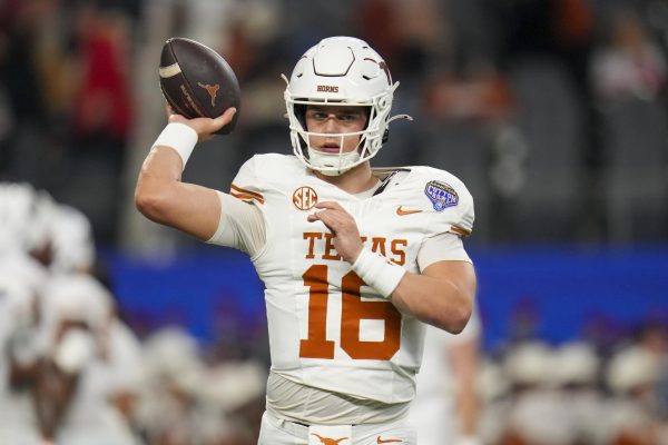 Quarterback for the University of Texas Arch Manning at the Goodyear Cotton Bowl Classic. Manning is ranked No. 1 in the NCAA for NIL valuation.  