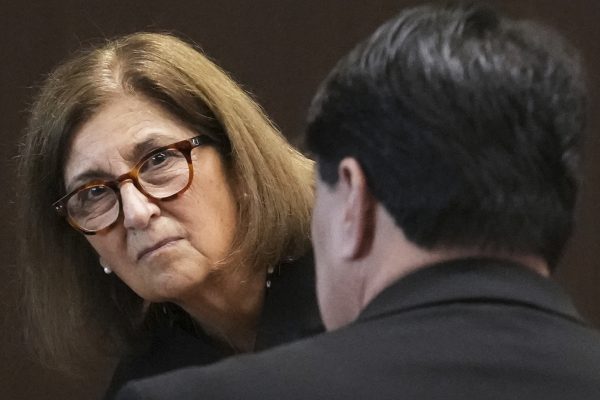 Judge Victoria A. Rossetti, left, listens to defense attorney Gregory Ticsay during the sentencing hearing for Robert E. Crimo III., at the Lake County Courthouse, in Waukegan, Ill., Wednesday, April 23, 2025, after pleading guilty in March to killing seven people and injuring dozens more when he opened fire on a 2022 Independence Day parade in Highland Park, Ill. (AP Photo/Nam Y. Huh, Pool)
