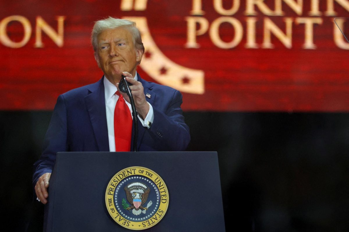 U.S. President Donald Trump speaks during a memorial service for her husband, slain conservative commentator Charlie Kirk, at State Farm Stadium in Arizona, U.S., September 21, 2025. REUTERS/Carlos Barria