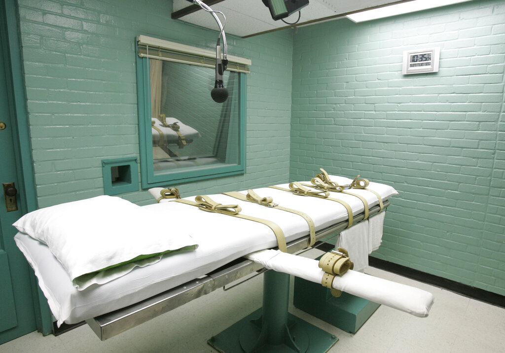 FILE - The state of Texas execution chamber in Huntsville, Texas, is pictured on May 27, 2008. A group of Texas death row inmates filed a federal lawsuit Thursday, Jan. 26, 2023, against the state’s prison system over its policy of permanently holding in solitary confinement all prisoners who are awaiting execution. (AP Photo/Pat Sullivan, File)